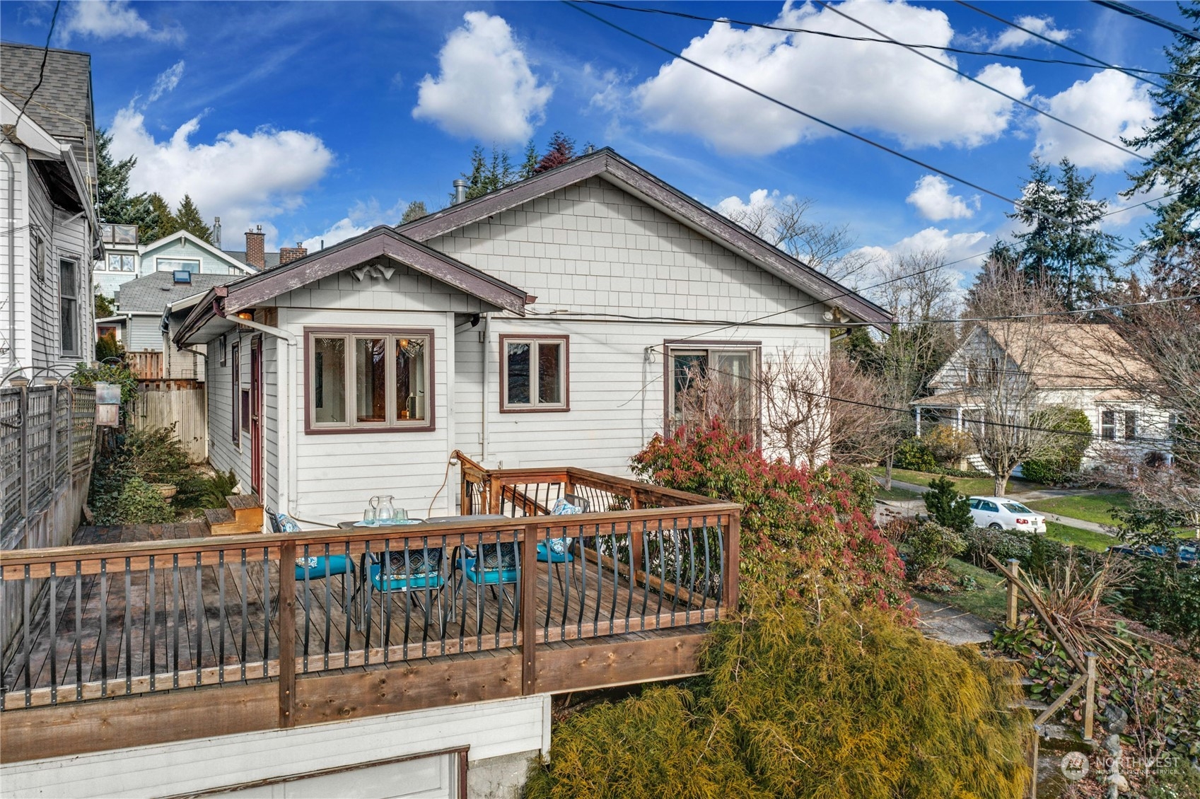 3603 Bagley Avenue North Seattle, WA 98103 - Photo 28 of 38 a view of a house with wooden deck