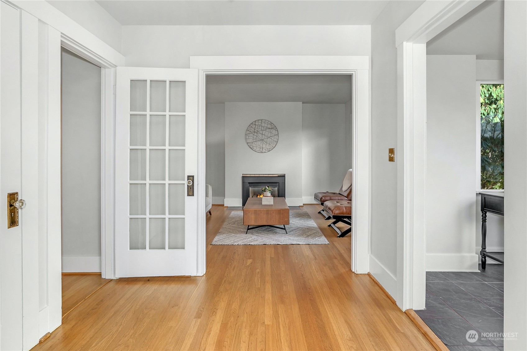 3603 Bagley Avenue North Seattle, WA 98103 - Photo 6 of 38 a living room with furniture and a fireplace