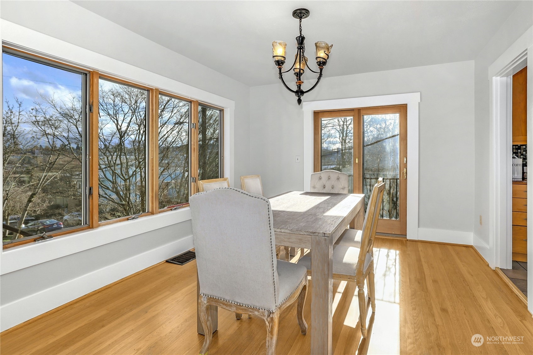 3603 Bagley Avenue North Seattle, WA 98103 - Photo 9 of 38 a view of a dining room with furniture window and wooden floor