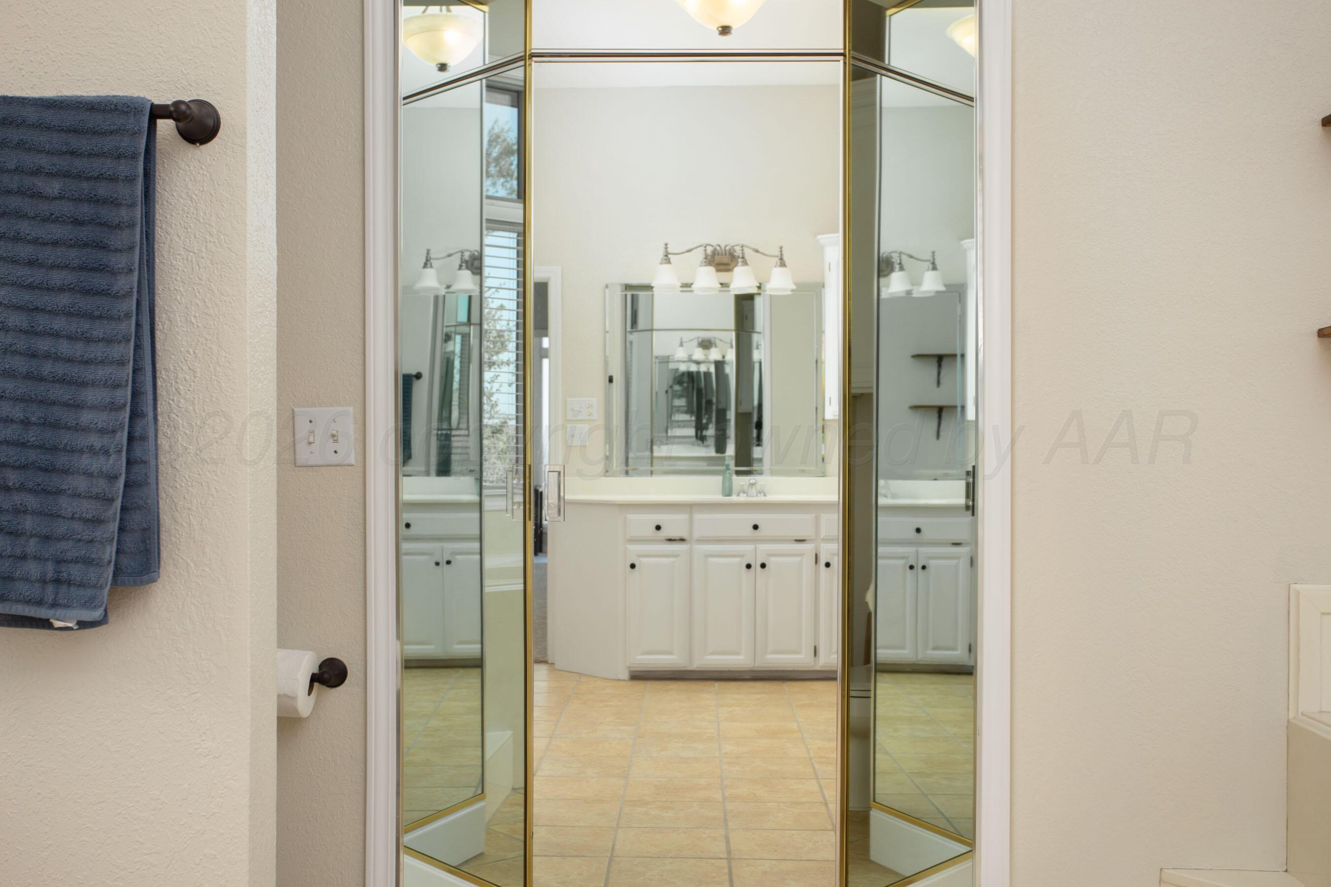 70 Stonebridge Gate Road Amarillo, TX 79124 - Photo 16 of 52 Mirror doors to master closet