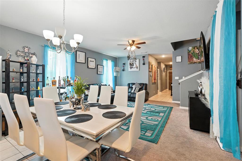 314 Frank Street Terrell, TX 75160 - Photo 12 of 40 a view of a dining room with furniture and a chandelier