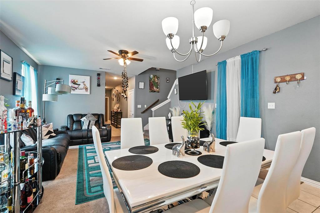 314 Frank Street Terrell, TX 75160 - Photo 13 of 40 a view of a dining room with furniture and chandelier
