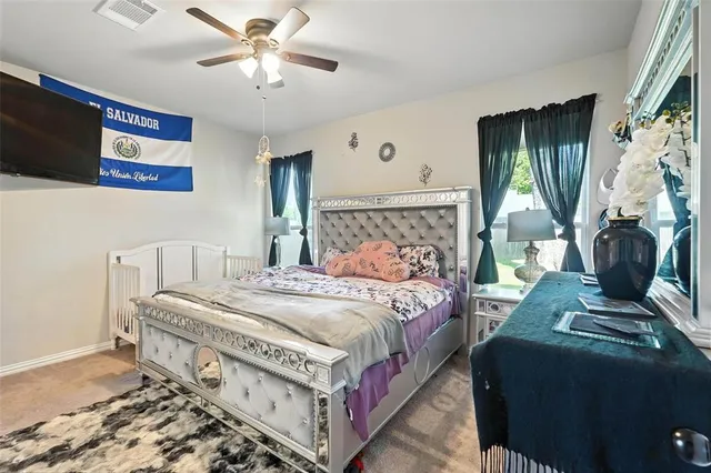 a kitchen with a granite countertop sink and a window