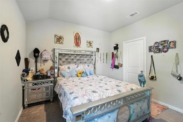 a view of a kitchen with appliances and cabinets