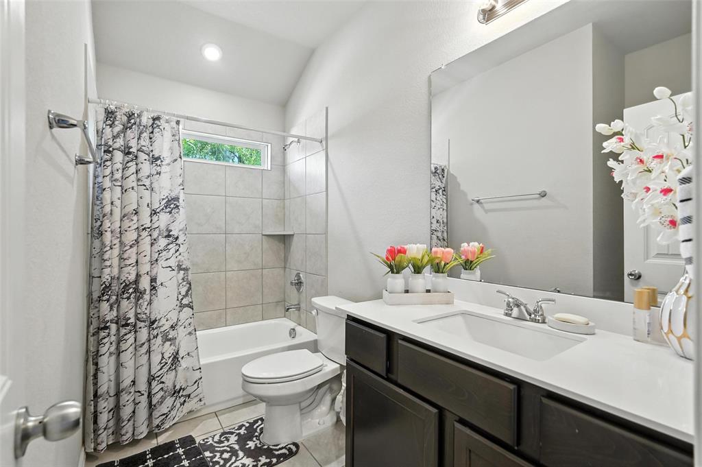 314 Frank Street Terrell, TX 75160 - Photo 28 of 40 a bathroom with a sink toilet and shower