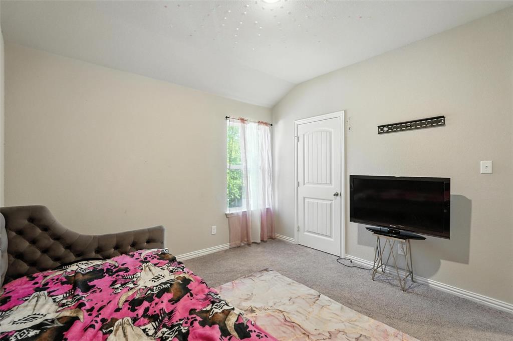 314 Frank Street Terrell, TX 75160 - Photo 32 of 40 a living room with furniture and a flat screen tv