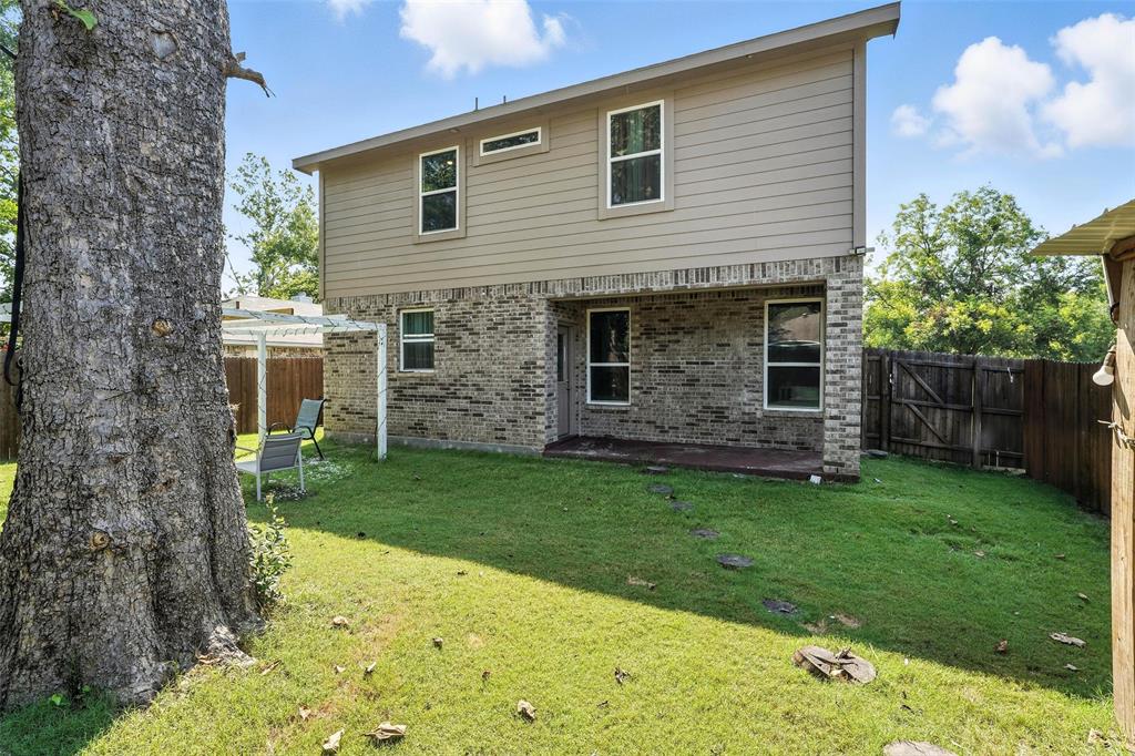 314 Frank Street Terrell, TX 75160 - Photo 37 of 40 a view of a house with a garden