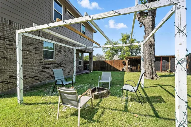 a view of a house with a garden