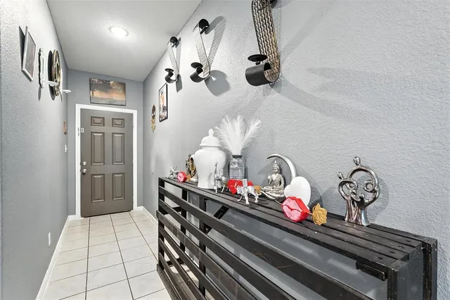 a room with lots of white furniture