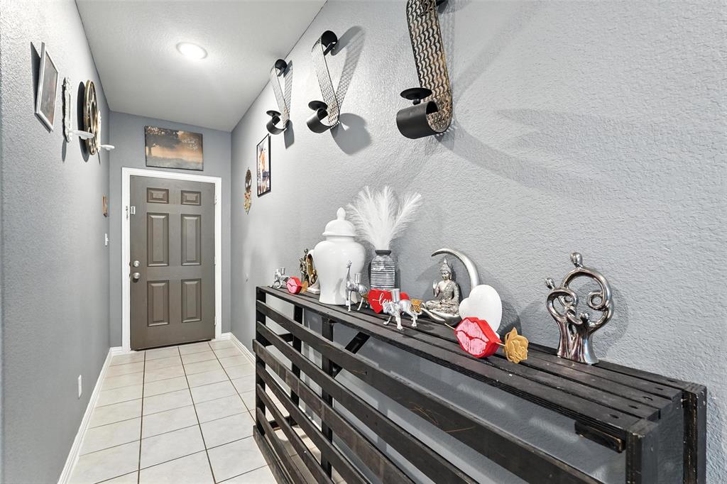 314 Frank Street Terrell, TX 75160 - Photo 5 of 40 a room with lots of white furniture