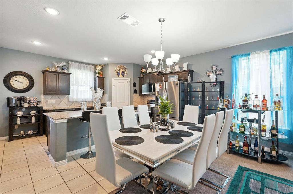 314 Frank Street Terrell, TX 75160 - Photo 10 of 40 a view of a dining room kitchen and a chandelier
