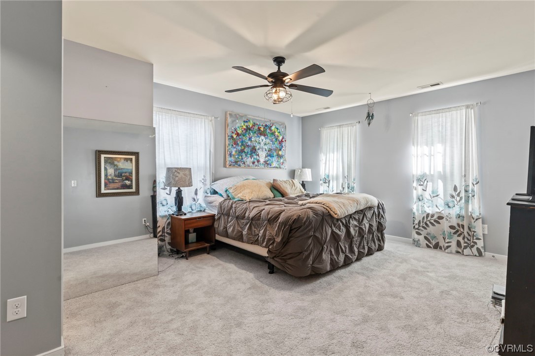 3800 Benton Avenue Richmond, VA 23222 - Photo 13 of 26 a spacious bedroom with a bed and window