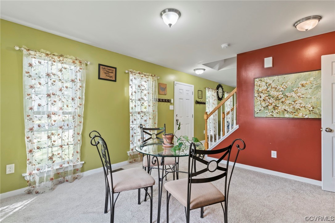 3800 Benton Avenue Richmond, VA 23222 - Photo 4 of 26 a view of a dining room with furniture and a large window