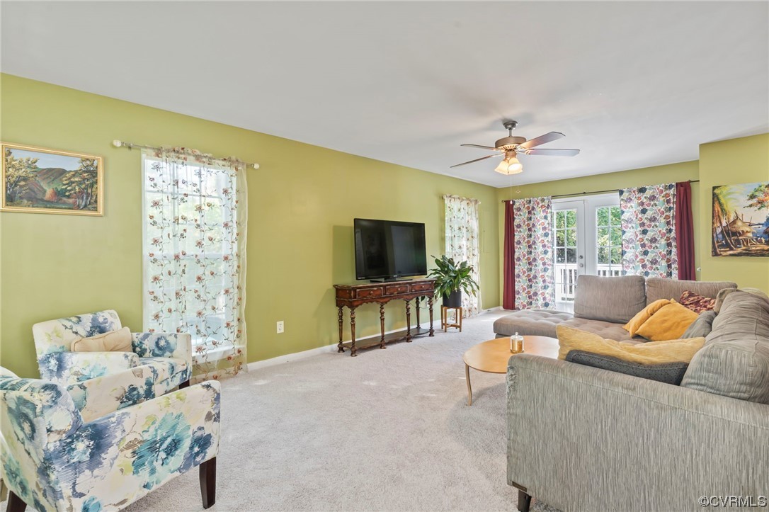 3800 Benton Avenue Richmond, VA 23222 - Photo 9 of 26 a living room with furniture and a flat screen tv