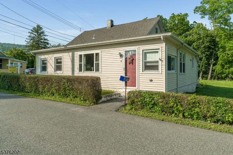front view of a house with a small yard