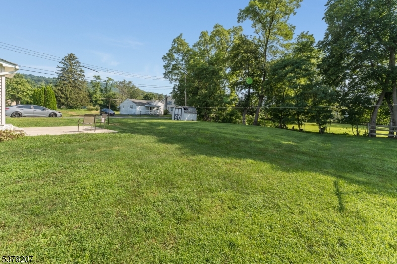 6 Franklin Street Washington, NJ 07882 - Photo 11 of 38 a view of a fountain in front of a house with a big yard