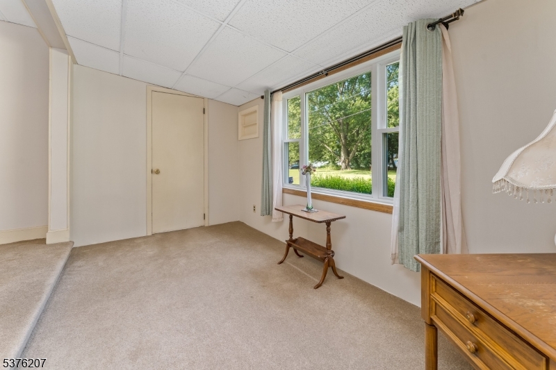 6 Franklin Street Washington, NJ 07882 - Photo 19 of 38 a view of room with a window and a hardwood