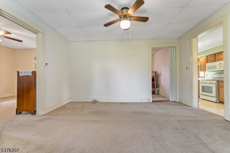 6 Franklin Street Washington, NJ 07882 - Photo 21 of 38 a view of a livingroom with a ceiling fan and window
