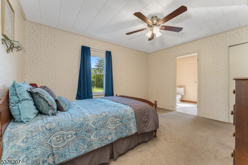 6 Franklin Street Washington, NJ 07882 - Photo 23 of 38 a bedroom with a bed and window