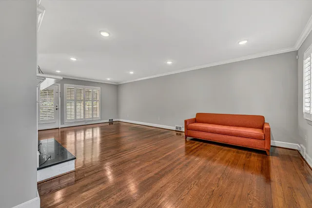 a room with furniture and wooden floor