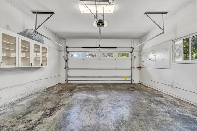 a view of empty room with windows