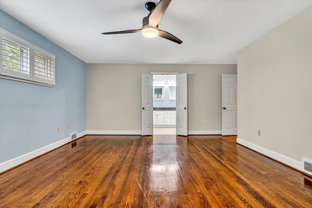 a kitchen with white cabinets