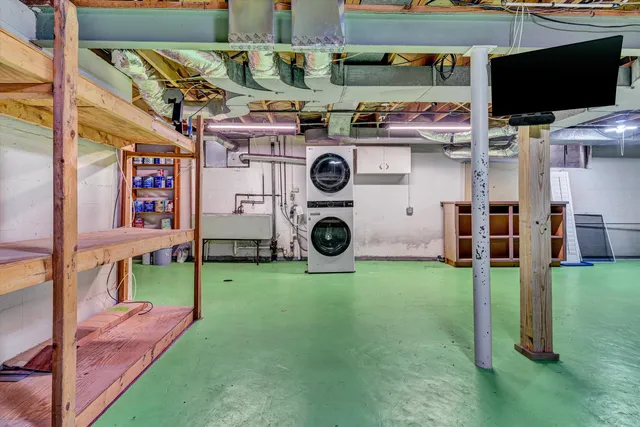a view of an empty room with stairs