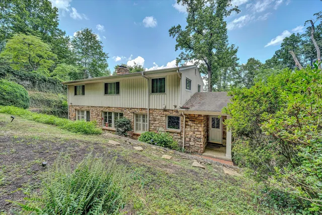 a front view of house with yard and porch