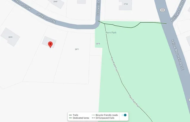 a picture of a book and a white bed