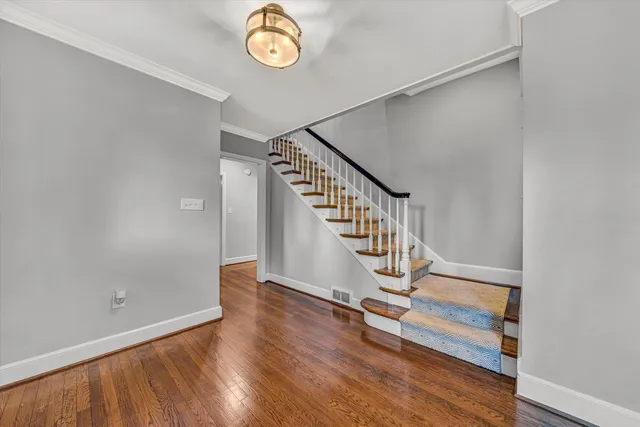 a view of entryway with wooden floor