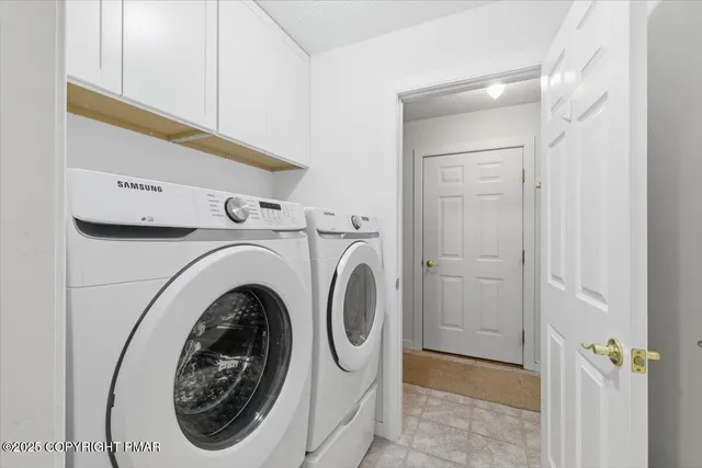 a bed room with a bed and a window