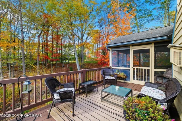 an aerial view of a house with a garden