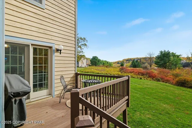a view of swimming pool from a yard