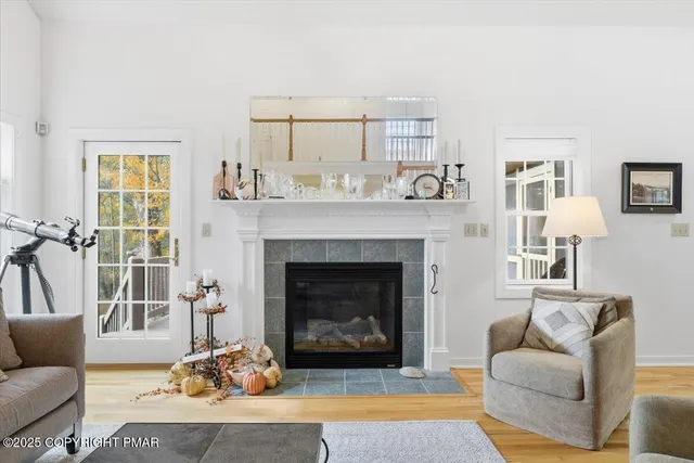 a bathroom with bathtub and window