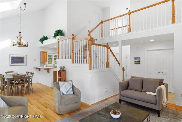a bathroom with a sink vanity mirror and toilet