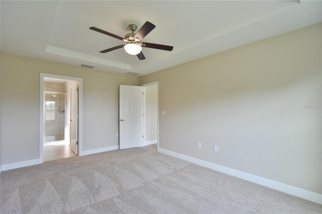 16219 Southwest 48th Circle Ocala, FL 34473 - Photo 28 of 36 a view of a livingroom with a ceiling fan