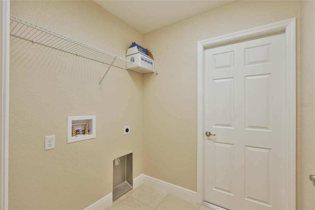 16219 Southwest 48th Circle Ocala, FL 34473 - Photo 35 of 36 a view of a hallway with a elevator