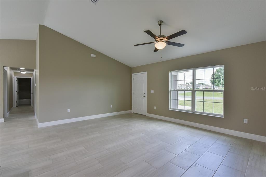 16219 Southwest 48th Circle Ocala, FL 34473 - Photo 7 of 36 a view of an empty room with a window