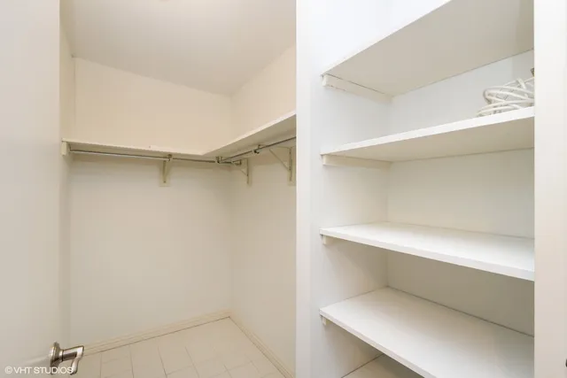 a storage room with washer and dryer