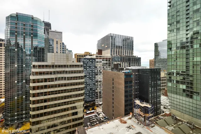 a view of a city with tall buildings