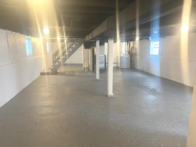 a view of empty room with windows