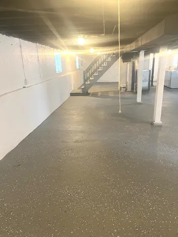 a view of an empty room with a glass door