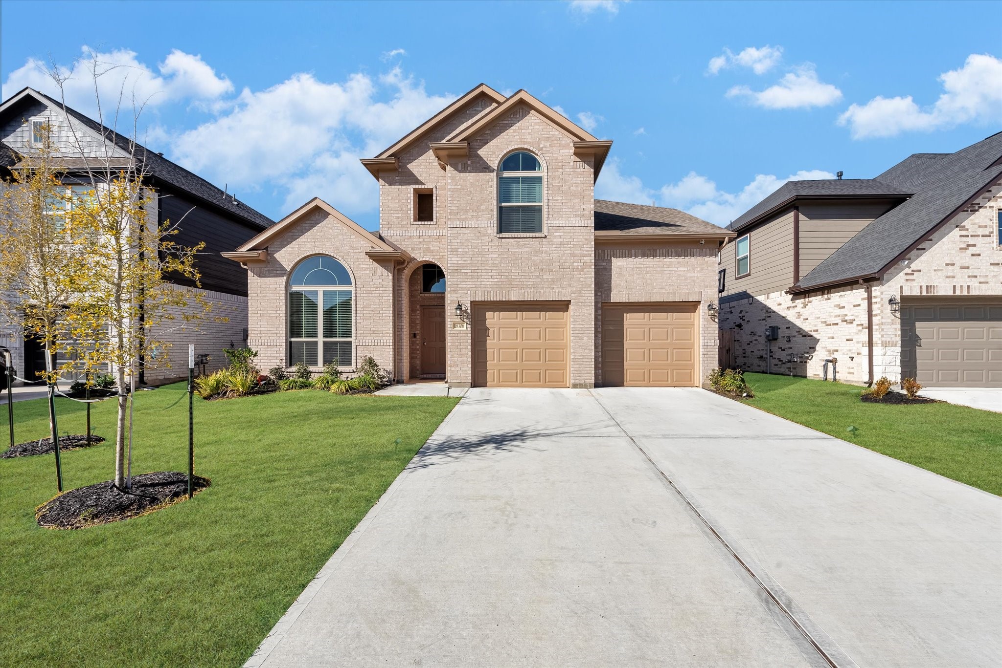 18306 Windy Knl Way Houston, TX 77084 - Photo 3 of 46 Enjoy the space/storage of 3-car tandem garage