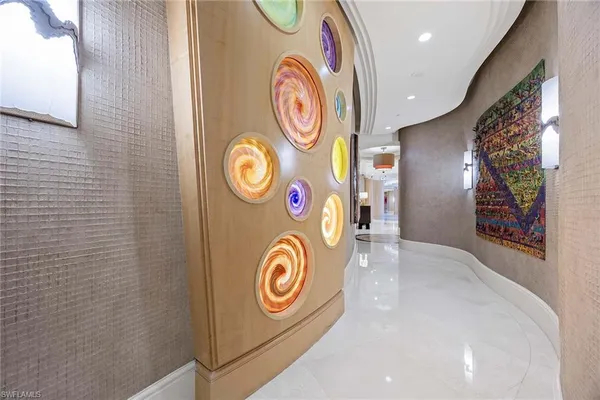 a view of a hallway with washer and dryer