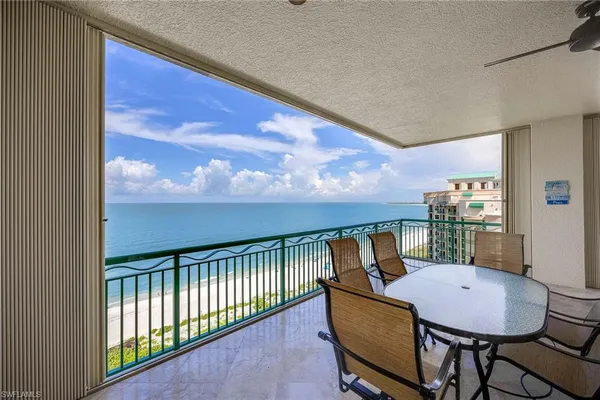 a view of an ocean and a yard