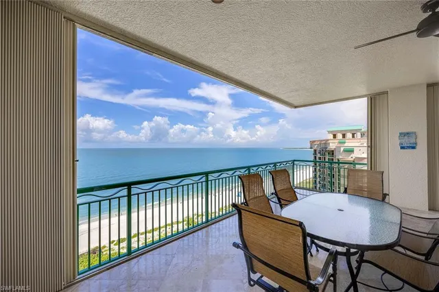 a view of an ocean and a yard