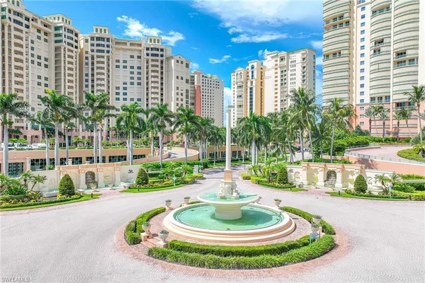 a view of a backyard with sitting area