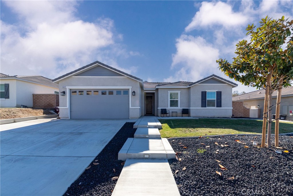 20661 Bison Mesa Road Riverside, CA 92507 - Photo 1 of 1 a front view of a house with swimming pool having outdoor seating