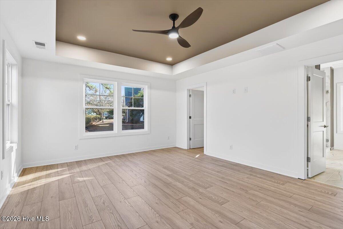 355 South Middleton Drive Northwest Calabash, NC 28467 - Photo 10 of 81 Private owner’s retreat on the first floor with a spacious walk-in closet and luxury bath finishes.