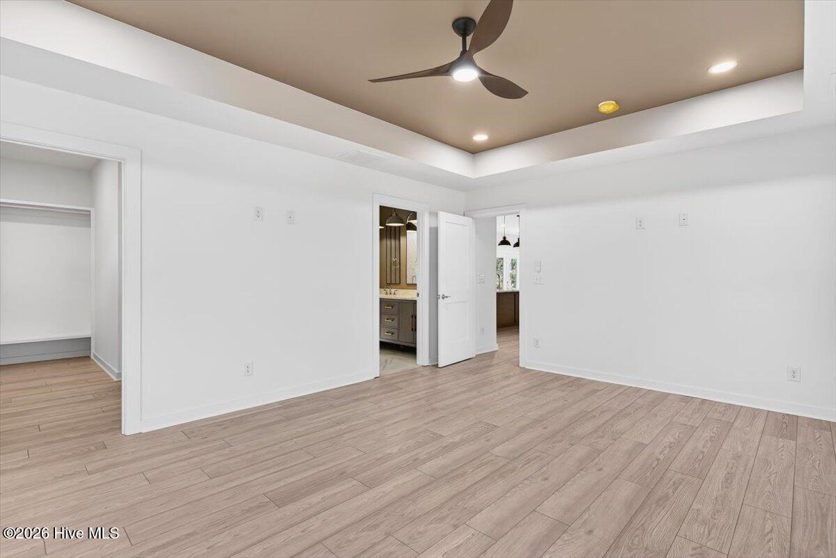 355 South Middleton Drive Northwest Calabash, NC 28467 - Photo 11 of 81 Spacious primary suite—perfect for winding down after a day of golf, beach time, or coastal exploring.